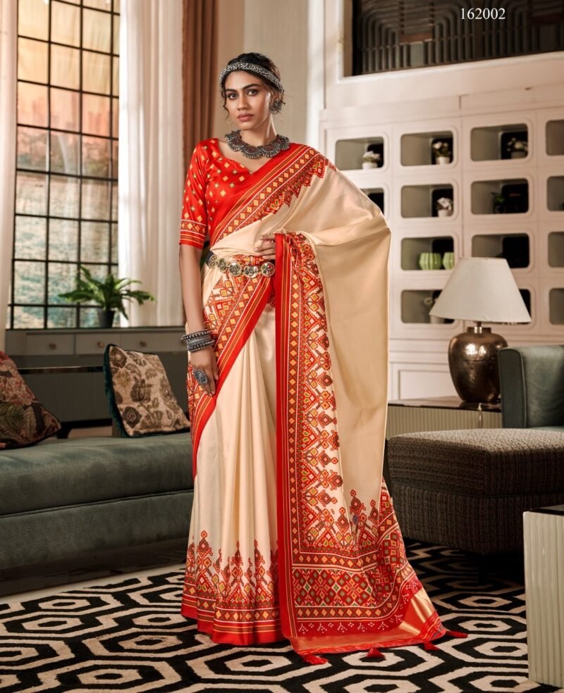 Peach Puff Tusser Patola Saree with Red Blouse and Patola Print