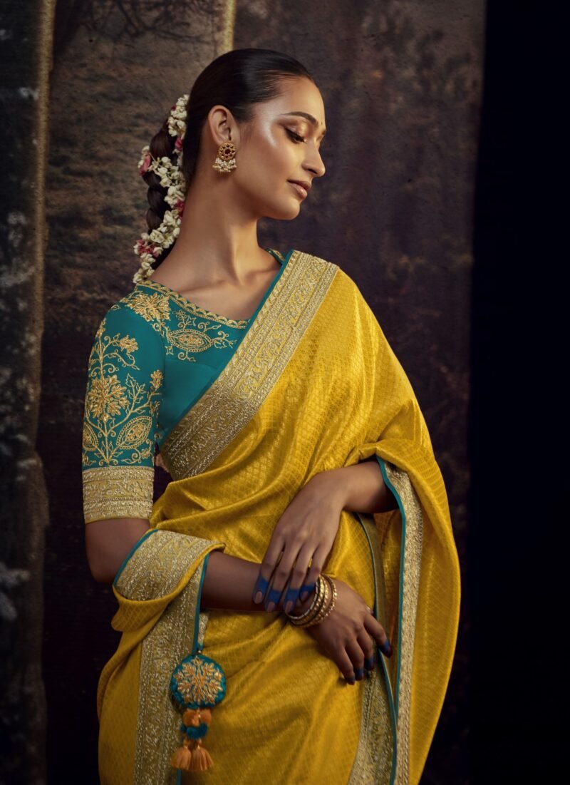 Radiant Yellow Silk Festive Saree with Heavy Embroidered Green Blouse