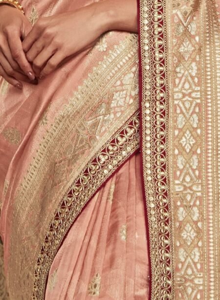 Radiant Elegance: Peach Dola Silk Saree with Exquisite Zari Weaving